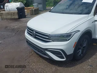2022 Volkswagen Tiguan SE z VIN 3VV2B7AX0NM079702, wystawiony jako IAAI lot #42600950 z przebiegiem 91 826 mil mil oraz . Historia ofert i sprzedaży dostępna na DreamBid. Obrazek 6.