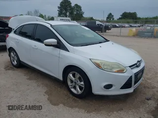 2014 Ford Focus SE with VIN 1FADP3F20EL255928, listed as a IAAI auction lot 41903677 with 119,214 mi miles. Bid and sale history available at carsss.com. Image 1.