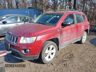 2013 Jeep Compass Latitude with VIN 1C4NJDEB3DD186328, listed as a IAAI auction lot 41357490 with 212,608 mi miles. Bid and sale history available at carsss.com. Image 2.
