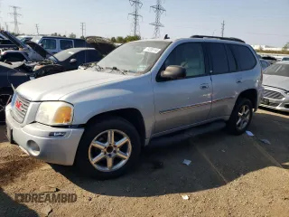 2007 GMC Envoy SLT with VIN 1GKDS13S572158514, listed as a Copart auction lot 74208144 with 209,797 mi miles and Salvage Title. Bid and sale history available at carsss.com. Image 1.