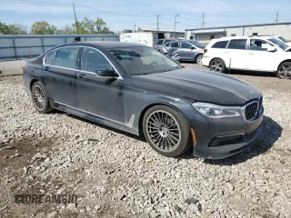 2019 BMW 7 Series with VIN WBA7F2C13KB242430, listed as a Copart auction lot 55525835 with 58,559 mi miles and Salvage title. Bid and sale history available at DreamBid. Image 4.
