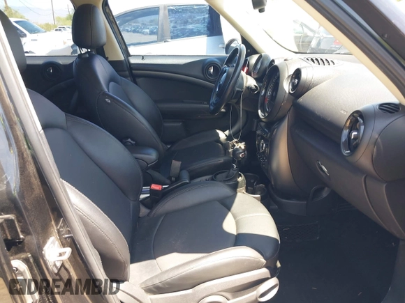 2015 MINI Countryman S with VIN WMWZC3C5XFWT02566, listed as a IAAI auction lot 42408045 with 114,822 mi miles and . Bid and sale history available at DreamBid. Image 5.