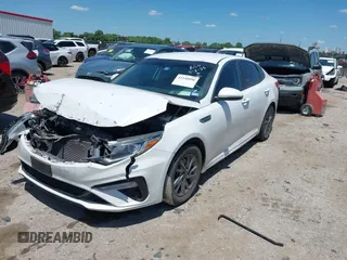 2019 Kia Optima LX z VIN 5XXGT4L38KG372576, wystawiony jako IAAI lot #42248090 z przebiegiem 98 368 mil mil oraz . Historia ofert i sprzedaży dostępna na DreamBid. Obrazek 2.