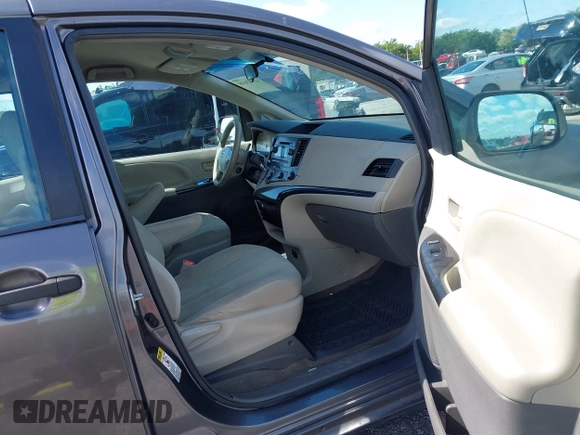2012 Toyota Sienna with VIN 5TDZK3DC8CS190719, listed as a IAAI auction lot 41983695 with 68,377 mi miles and . Bid and sale history available at DreamBid. Image 5.
