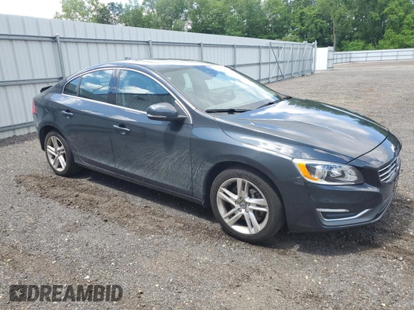 2014 Volvo S60 T5 z VIN YV1612FS6E1287285, wystawiony jako Copart lot #56614785 z przebiegiem 104 637 mil mil oraz Szkody całkowita. Historia ofert i sprzedaży dostępna na DreamBid. Obrazek 4.