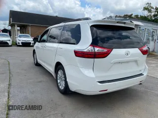 2016 Toyota Sienna XLE with VIN 5TDYK3DC3GS761177, listed as a Copart auction lot 61506935 with 134,732 mi miles and Clean title. Bid and sale history available at DreamBid. Image 3.