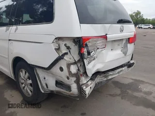 2009 Honda Odyssey EX с VIN 5FNRL38429B011720, выставлен на аукционе IAAI как лот 42034163 с пробегом 168 729 миль миль и . История ставок и продаж доступна на DreamBid. Изображение 13.
