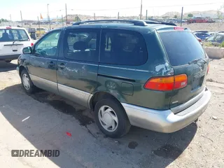 2000 Toyota Sienna LE z VIN 4T3ZF13C8YU215604, wystawiony jako IAAI lot #42348047 z przebiegiem 286 642 mil mil oraz . Historia ofert i sprzedaży dostępna na DreamBid. Obrazek 3.