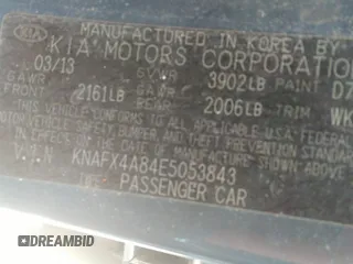 2014 Kia Forte EX with VIN KNAFX4A84E5053843, listed as a IAAI auction lot 42206701 with 115,193 mi miles. Bid and sale history available at carsss.com. Image 9.