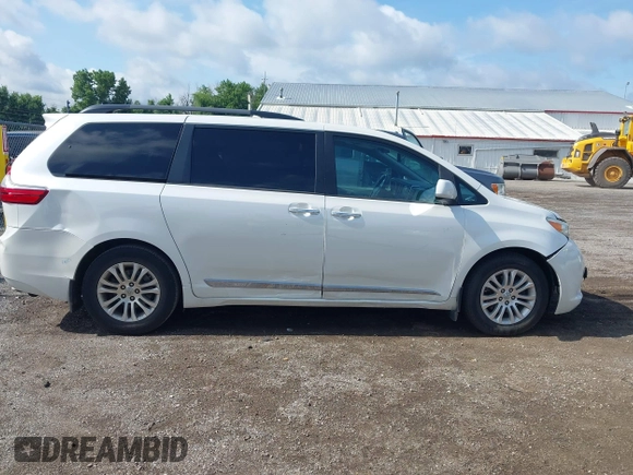 2016 Toyota Sienna XLE with VIN 5TDYK3DC4GS748888, listed as a IAAI auction lot 42605968 with 164,811 mi miles and . Bid and sale history available at DreamBid. Image 13.