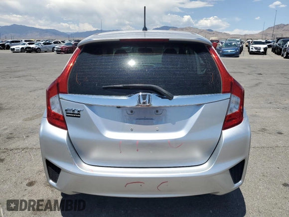 2016 Honda Fit EX with VIN JHMGK5H79GX020531, listed as a Copart auction lot 60224965 with 98,295 mi miles and Salvage title. Bid and sale history available at DreamBid. Image 6.