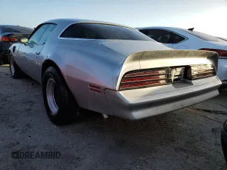 1977 Pontiac Firebird z VIN 2W87Z7N152633, wystawiony jako Copart lot #41438935 z przebiegiem 17 837 mil mil oraz Nie do naprawy. Historia ofert i sprzedaży dostępna na DreamBid. Obrazek 2.