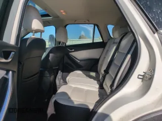 2016 Mazda CX-5 Grand Touring with VIN JM3KE4DY8G0671256, listed as a Copart auction lot 52920975 with 87,822 mi miles and Non Repairable. Bid and sale history available at carsss.com. Image 11.