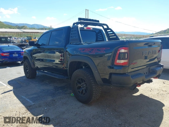 2022 Ram 1500 TRX with VIN 1C6SRFU95NN346475, listed as a IAAI auction lot 39200422 with 14,919 mi miles and . Bid and sale history available at DreamBid. Image 3.