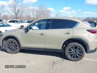 2024 Mazda CX-5 Carbon Edition with VIN JM3KFBAYXR0371954, listed as a IAAI auction lot 41688598 with 13,230 mi miles and . Bid and sale history available at DreamBid. Image 14.