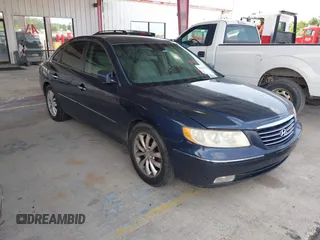 2007 Hyundai Azera SE z VIN KMHFC46FX7A147219, wystawiony jako IAAI lot #42346432 z przebiegiem 163 646 mil mil oraz . Historia ofert i sprzedaży dostępna na DreamBid. Obrazek 1.
