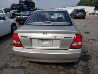 2003 Mazda Protege DX with VIN JM1BJ225X30107443, listed as a Copart auction lot 54777625 with 283,760 mi miles and Clean Title. Bid and sale history available at DreamBid. Image 6.