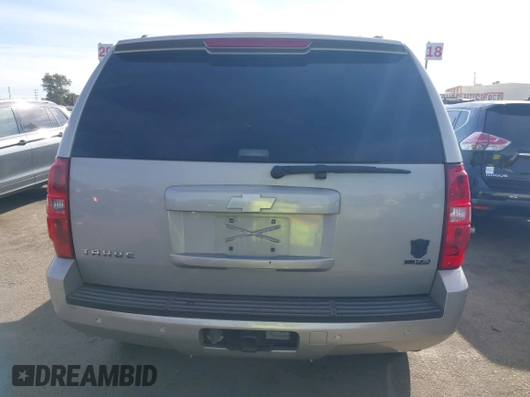 2007 Chevrolet Tahoe LTZ with VIN 1GNFC13077J399911, listed as a IAAI auction lot 41141878 with Not provided miles and . Bid and sale history available at DreamBid. Image 15.