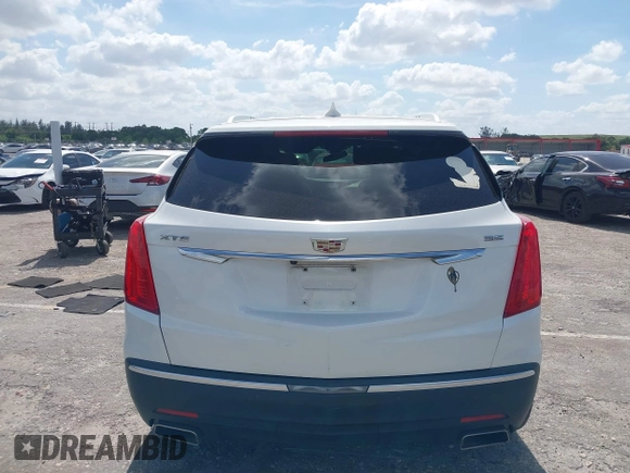 2017 Cadillac XT5 Premium Luxury FWD z VIN 1GYKNCRS5HZ230621, wystawiony jako IAAI lot #42123597 z przebiegiem 88 268 mil mil oraz . Historia ofert i sprzedaży dostępna na DreamBid. Obrazek 17.