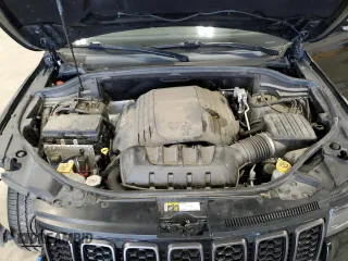 2019 Jeep Grand Cherokee Overland with VIN 1C4RJFCT8KC610341, listed as a Copart auction lot 83424454 with 57,356 mi miles and Salvage Title. Bid and sale history available at carsss.com. Image 12.