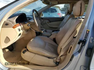 2002 Mercedes-Benz S-Class 4.3L with VIN WDBNG70J52A258559, listed as a Copart auction lot 80451294 with 283,626 mi miles and Salvage Title. Bid and sale history available at carsss.com. Image 7.