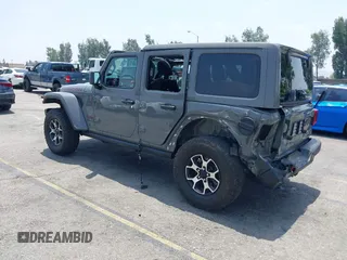 2020 Jeep Wrangler Unlimited Rubicon with VIN 1C4HJXFG3LW279636, listed as a IAAI auction lot 42430354 with 19,631 mi miles and . Bid and sale history available at DreamBid. Image 3.