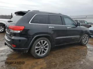 2017 Jeep Grand Cherokee Overland with VIN 1C4RJFCG0HC836448, listed as a Copart auction lot 47053705 with 87,459 mi miles and Salvage Title. Bid and sale history available at carsss.com. Image 3.