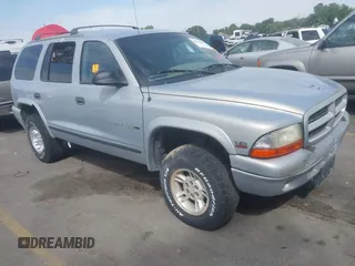 1999 Dodge Durango z VIN 1B4HS28Y4XF621359, wystawiony jako IAAI lot #42597668 z przebiegiem Nie podano mil oraz . Historia ofert i sprzedaży dostępna na DreamBid. Obrazek 1.