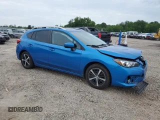 2022 Subaru Impreza Premium with VIN 4S3GTAV60N3711910, listed as a Copart auction lot 60787035 with 58,828 mi miles and Salvage title. Bid and sale history available at DreamBid. Image 4.