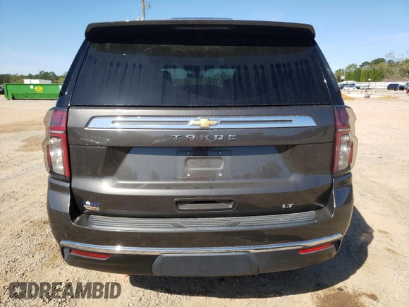 2021 Chevrolet Tahoe LT with VIN 1GNSCNKD5MR238092, listed as a Copart auction lot 47232764 with 76,847 mi miles and Salvage title. Bid and sale history available at DreamBid. Image 6.