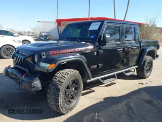 2020 Jeep Gladiator Rubicon z VIN 1C6JJTBG0LL117908, wystawiony jako IAAI lot #41621920 z przebiegiem 61 233 mil mil oraz . Historia ofert i sprzedaży dostępna na DreamBid. Obrazek 6.