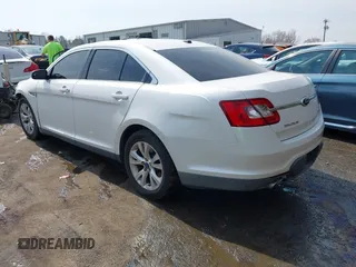 2012 Ford Taurus SEL with VIN 1FAHP2EW9CG121263, listed as a IAAI auction lot 41785838 with 185,433 mi miles and . Bid and sale history available at DreamBid. Image 3.