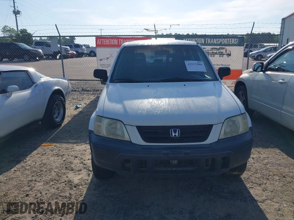 2000 Honda CR-V LX with VIN JHLRD2844YC011658, listed as a IAAI auction lot 42117486 with 185,206 mi miles. Bid and sale history available at carsss.com. Image 15.