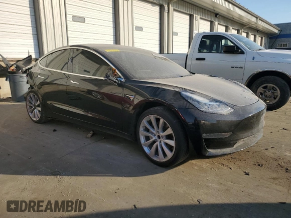 2019 Tesla Model 3 Mid Range with VIN 5YJ3E1EA9KF412525, listed as a Copart auction lot 48689825 with 134,768 mi miles and Salvage Title. Bid and sale history available at DreamBid. Image 4.