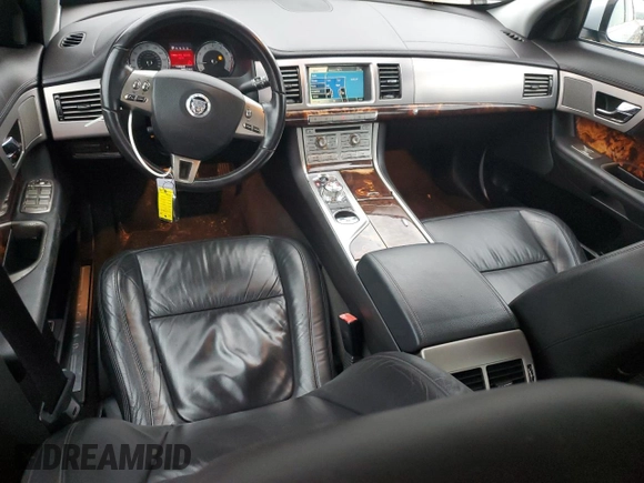 2011 Jaguar XF with VIN SAJWA0FB6BLS12162, listed as a Copart auction lot 86744904 with 135,943 mi miles and Salvage Title. Bid and sale history available at carsss.com. Image 8.