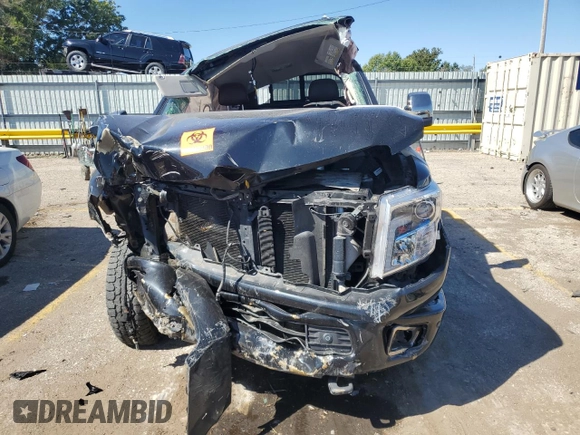 2017 Nissan Titan Platinum Reserve z VIN 1N6BA1F45HN546567, wystawiony jako Copart lot #73242964 z przebiegiem Nie podano mil oraz Szkoda całkowita • Salvage title. Historia ofert i sprzedaży dostępna na DreamBid. Obrazek 5.