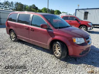 2018 Dodge Grand Caravan SXT with VIN 2C4RDGCG7JR159568, listed as a Copart auction lot 53484625 with 148,010 mi miles and Salvage Title. Bid and sale history available at DreamBid. Image 4.