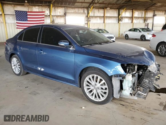 2015 Volkswagen Jetta SE with VIN 3VWD17AJ4FM319385, listed as a Copart auction lot 58380125 with 124,877 mi miles and Salvage title. Bid and sale history available at DreamBid. Image 4.