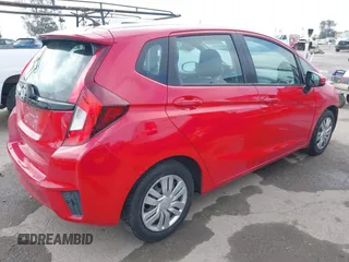 2015 Honda Fit LX with VIN 3HGGK5H52FM762596, listed as a IAAI auction lot 42129871 with 62,323 mi miles and . Bid and sale history available at DreamBid. Image 4.