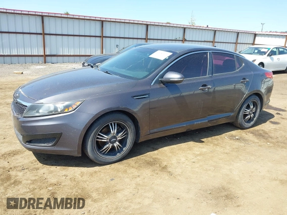 2011 Kia Optima LX with VIN KNAGM4A79B5063381, listed as a IAAI auction lot 42157171 with 175,069 mi miles and . Bid and sale history available at carsss.com. Image 2.