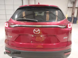 2019 Mazda CX-9 Touring with VIN JM3TCACY1K0331904, listed as a IAAI auction lot 42146945 with 77,699 mi miles and . Bid and sale history available at DreamBid. Image 16.