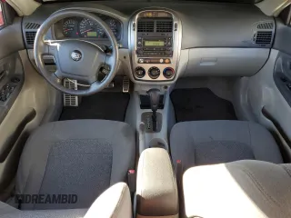 2005 Kia Spectra with VIN KNAFE161455146328, listed as a Copart auction lot 77605534 with 110,605 mi miles and Salvage Title. Bid and sale history available at carsss.com. Image 8.