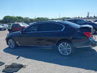 2018 BMW 7 Series 750i with VIN WBA7F0C54JGM22900, listed as a IAAI auction lot 41673673 with 66,264 mi miles. Bid and sale history available at carsss.com. Image 13.