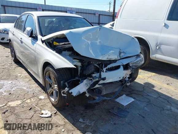 2013 BMW 3 Series 320i with VIN WBA3B1C56DF462549, listed as a IAAI auction lot 41411287 with 119,146 mi miles. Bid and sale history available at carsss.com. Image 1.