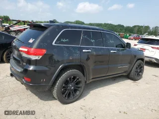 2014 Jeep Grand Cherokee Overland with VIN 1C4RJFCG6EC547604, listed as a Copart auction lot 55824944 with 128,330 mi miles and Clean Title. Bid and sale history available at carsss.com. Image 3.