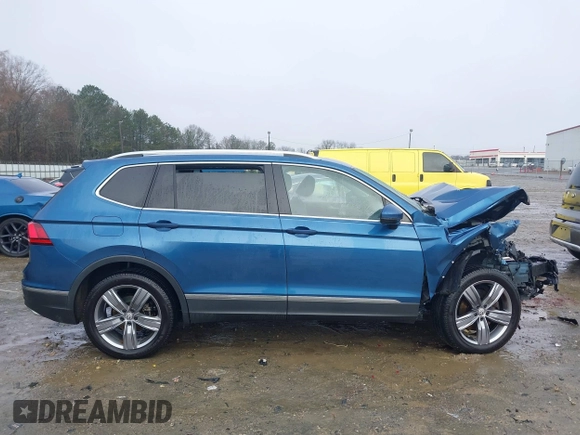 2020 Volkswagen Tiguan SE z VIN 3VV3B7AX5LM176136, wystawiony jako IAAI lot #41564431 z przebiegiem 74 867 mil mil oraz . Historia ofert i sprzedaży dostępna na DreamBid. Obrazek 13.