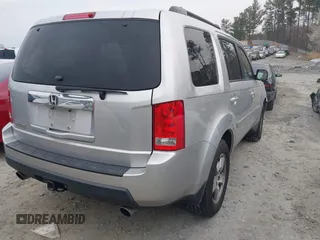 2010 Honda Pilot EX with VIN 5FNYF3H41AB009318, listed as a IAAI auction lot 41759335 with 231,174 mi miles and . Bid and sale history available at carsss.com. Image 4.