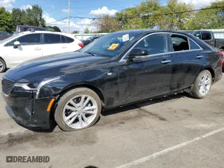 2023 Cadillac CT4 Luxury with VIN 1G6DK5RK4P0107157, listed as a Copart auction lot 71153704 with 12,336 mi miles and Salvage Title. Bid and sale history available at carsss.com. Image 1.