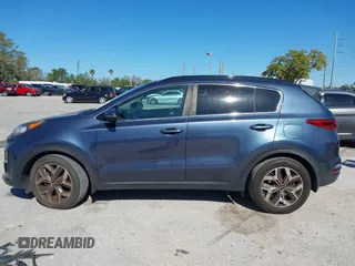 2020 Kia Sportage EX z VIN KNDPN3AC7L7781783, wystawiony jako IAAI lot #41739626 z przebiegiem 103 413 mil mil oraz . Historia ofert i sprzedaży dostępna na DreamBid. Obrazek 14.