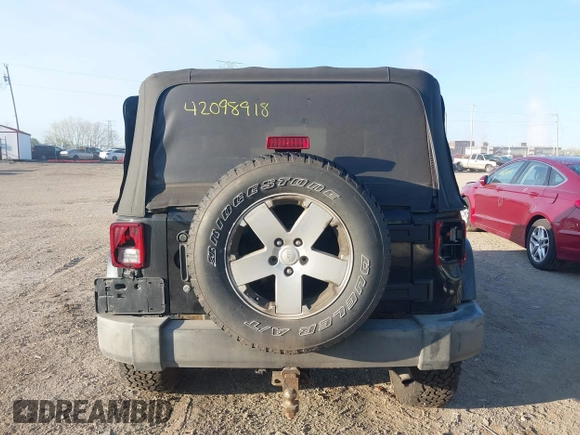 2007 Jeep Wrangler Sahara with VIN 1J4FA54167L204991, listed as a IAAI auction lot 42098918 with 236,845 mi miles and . Bid and sale history available at DreamBid. Image 17.